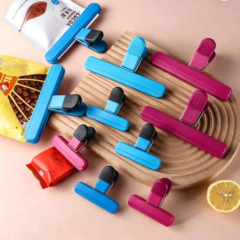 Kitchen Gadgets Ninja - คลิปหนีบปิดปากถุงพลาสติกแบบพกพา 4 ชิ้น, ที่หนีบปิดปากถุงอาหารและขนม, อุปกรณ์ปิดผนึกอเนกประสงค์สำหรับอุปกรณ์จัดเก็บในครัว